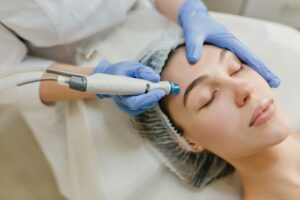 MBeauty practitioner performing a skincare treatment